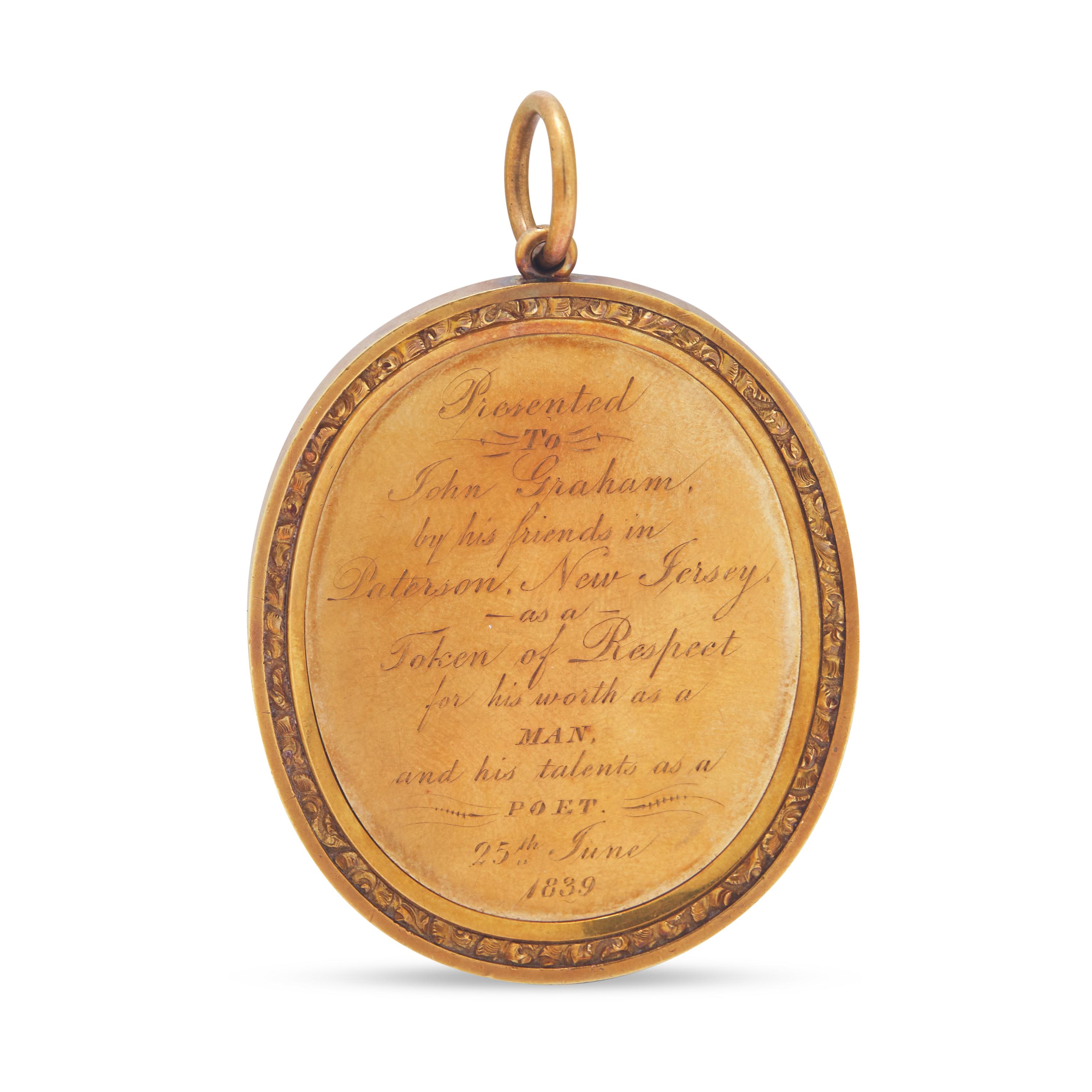 An Engraved Gold Presentation Pendant