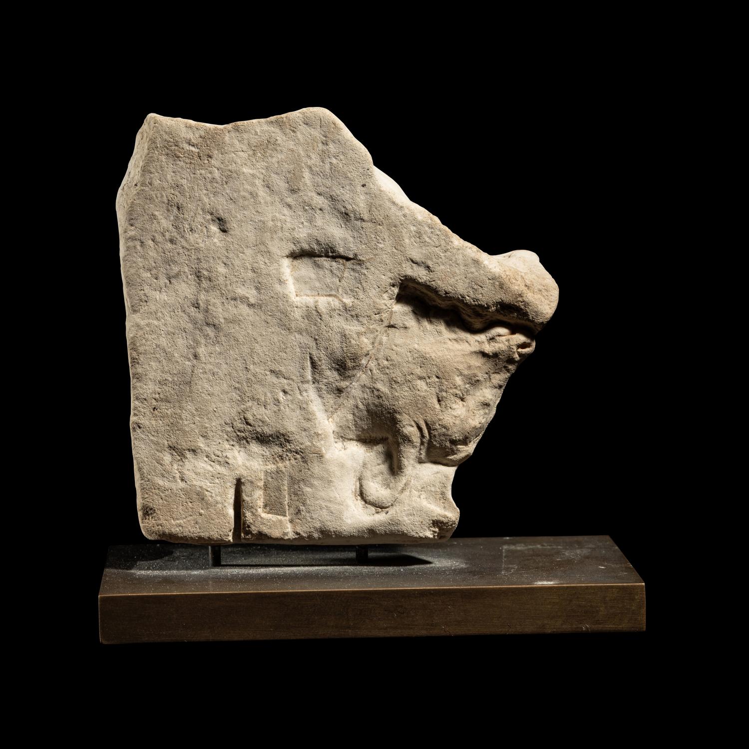 An Egyptian Limestone Sculptor's Model of a Goat