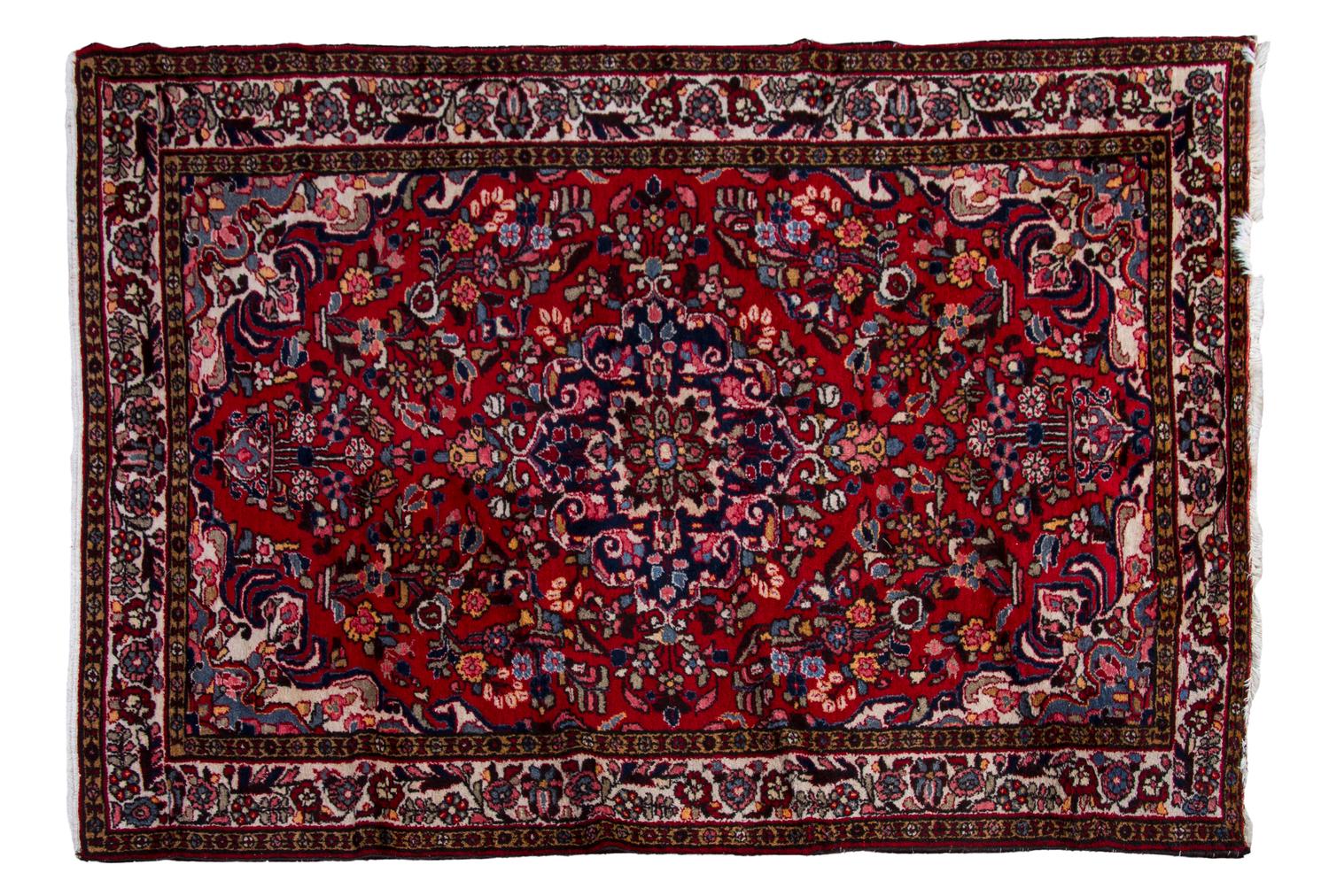 An Isfahan Wool Rug, 7 feet 3 inches x 4 feet 10 inches.