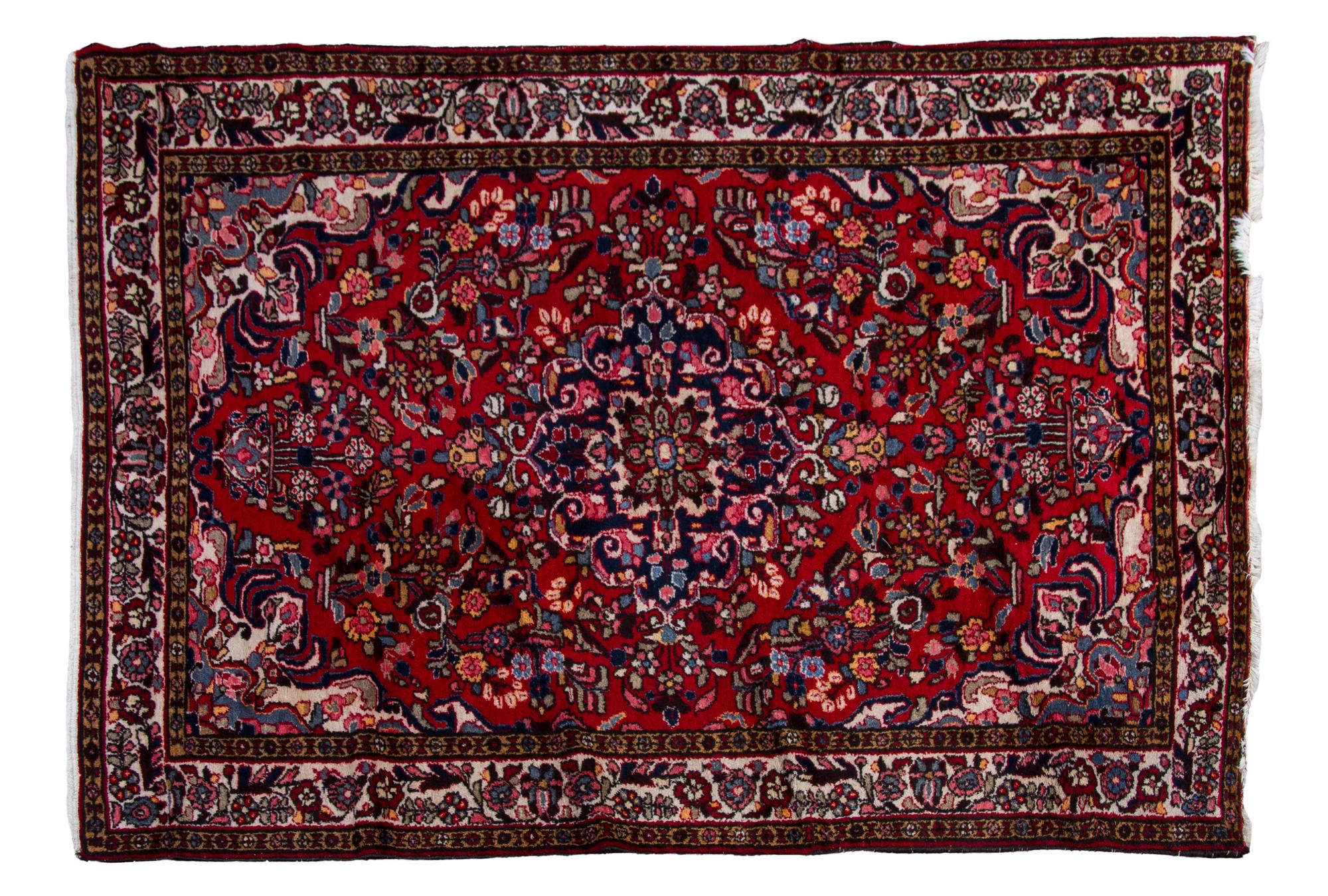 An Isfahan Wool Rug, 7 feet 3 inches x 4 feet 10 inches.