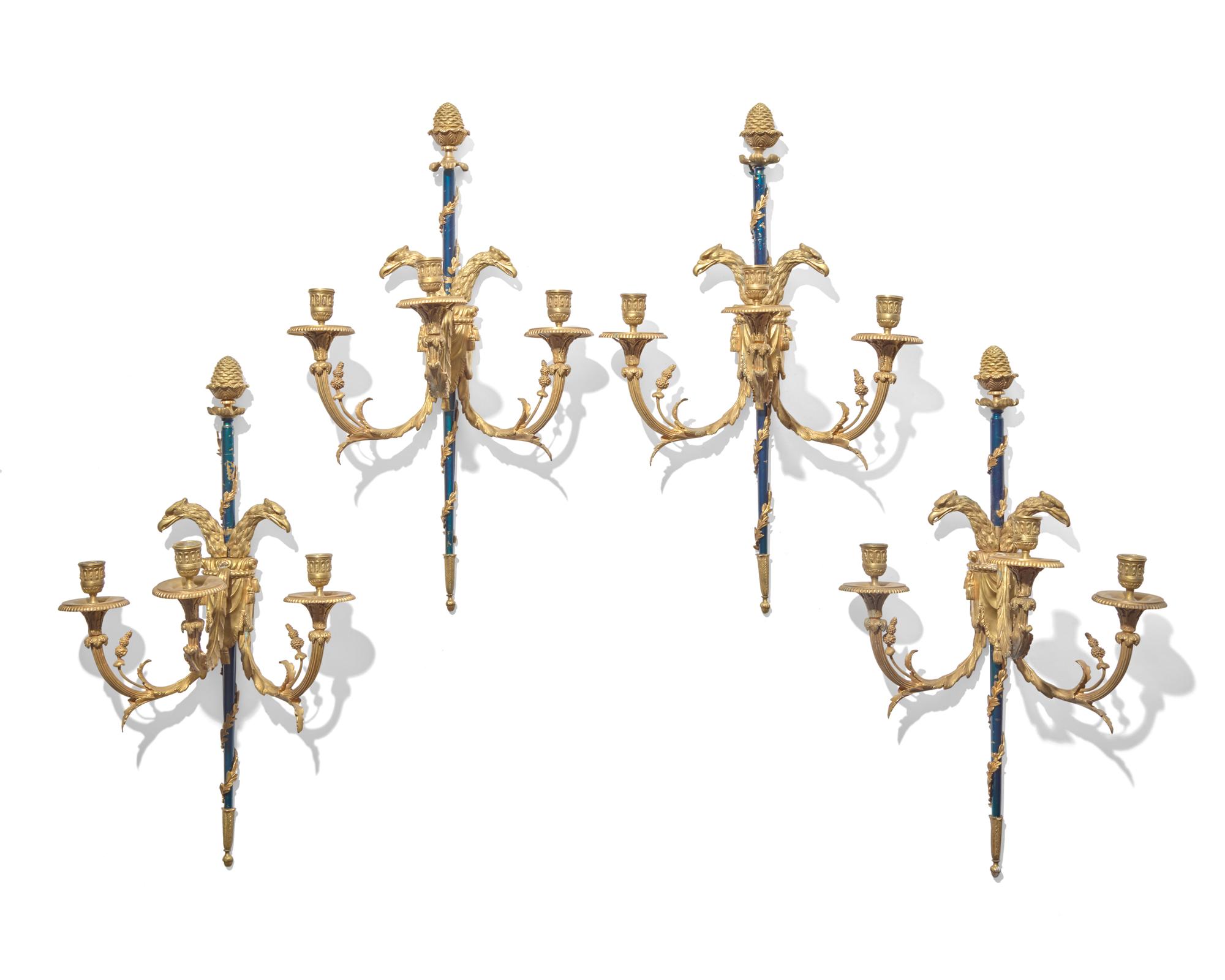 A set of four Continental Neoclassical blue enameled and gilt-bronze wall sconces, probably 19th century