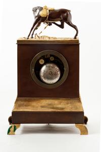 An Empire Style Gilt and Patinated Bronze Mantel Clock