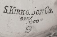 A Collection of S. Kirk and Son Repousse Table Articles
