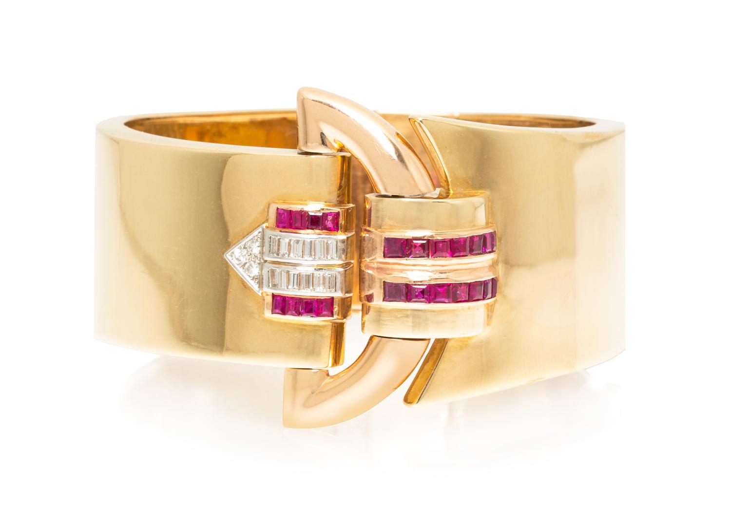 A Retro Rose Gold, Platinum, Ruby and Diamond Bangle Bracelet, 38.30 dwts.
