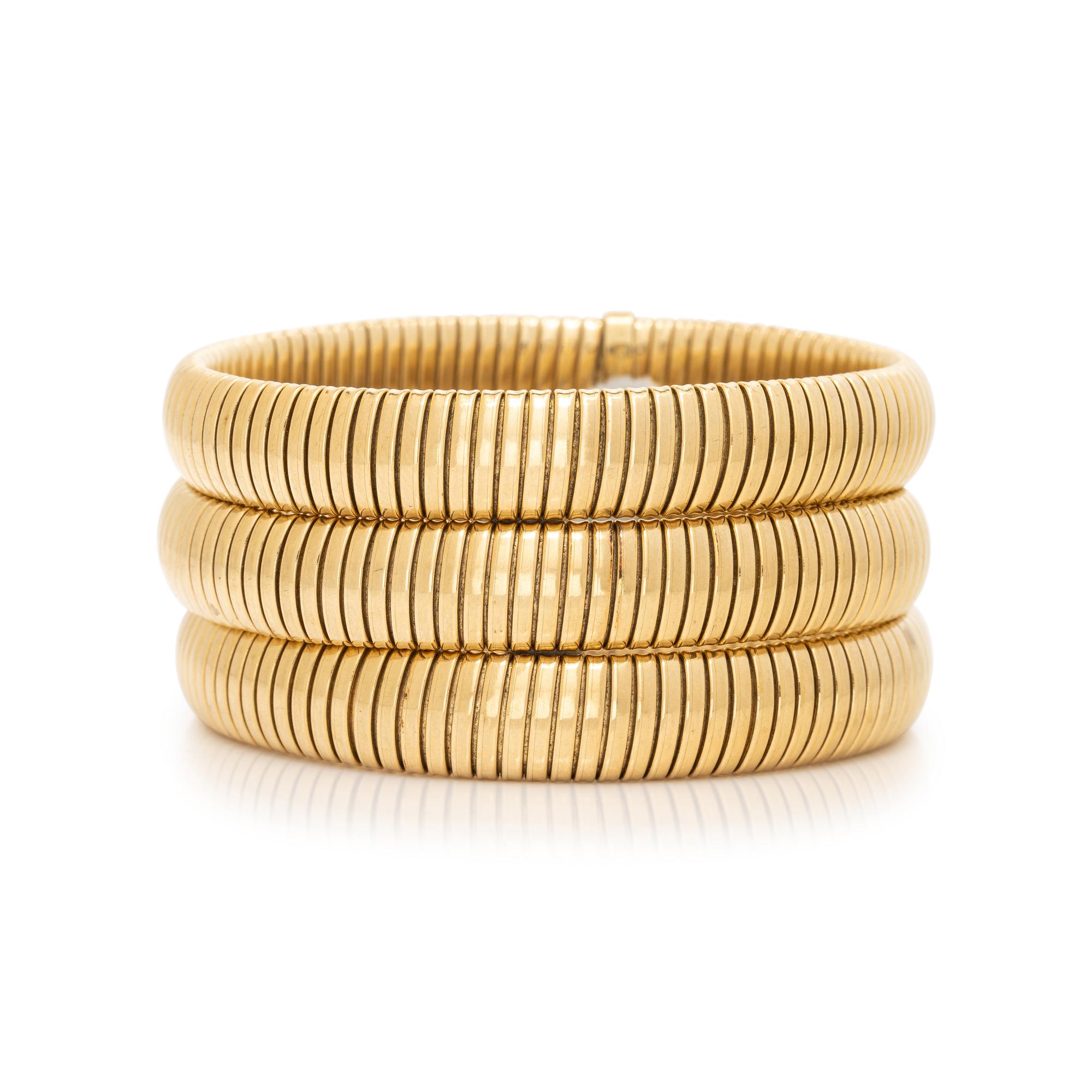 COLLECTION OF YELLOW GOLD TUBOGAS BRACELETS