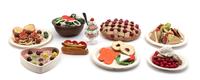 A Collection of Painted Ceramic Faux Food Plates and Bowls — 20TH CENTURY
