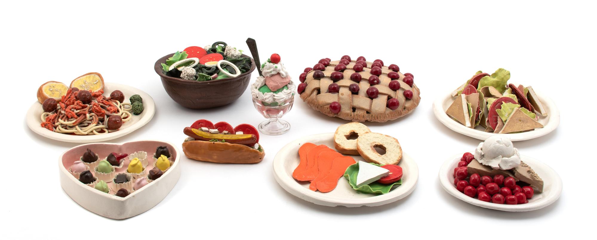 A Collection of Painted Ceramic Faux Food Plates and Bowls — 20TH CENTURY