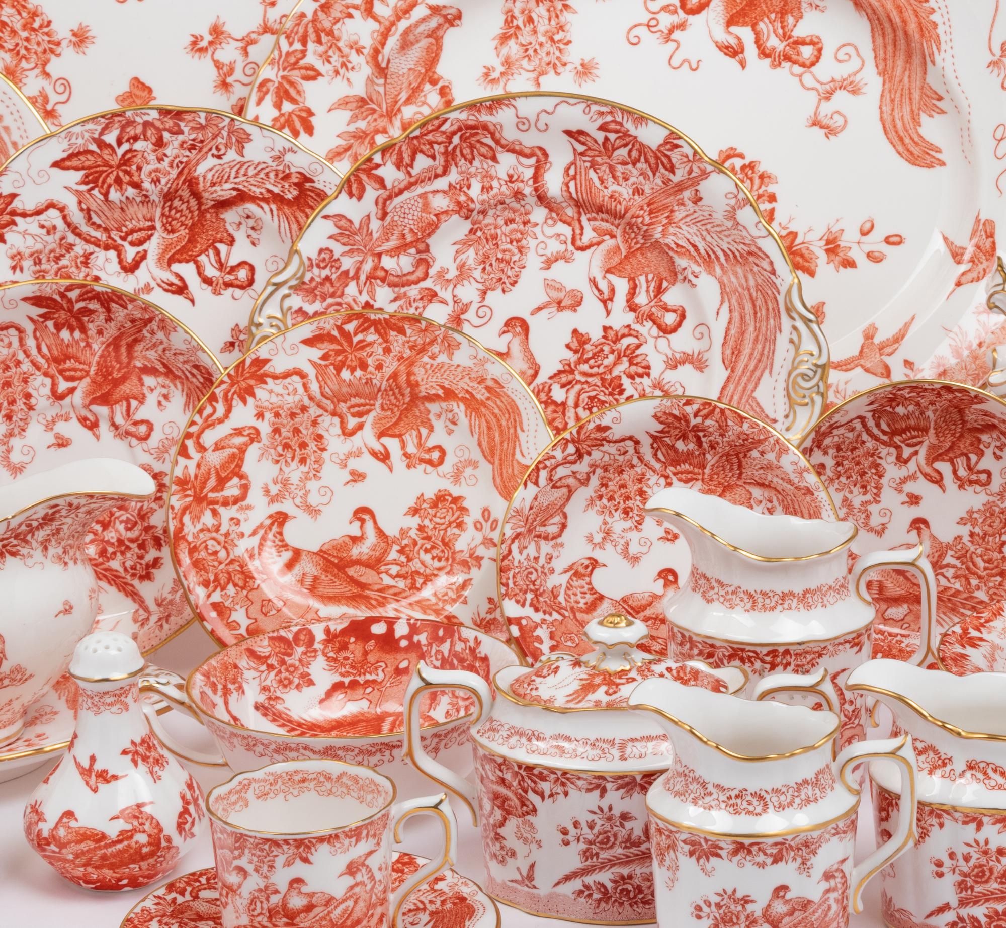 A Royal Crown Derby Red Aves Porcelain Dinner Service