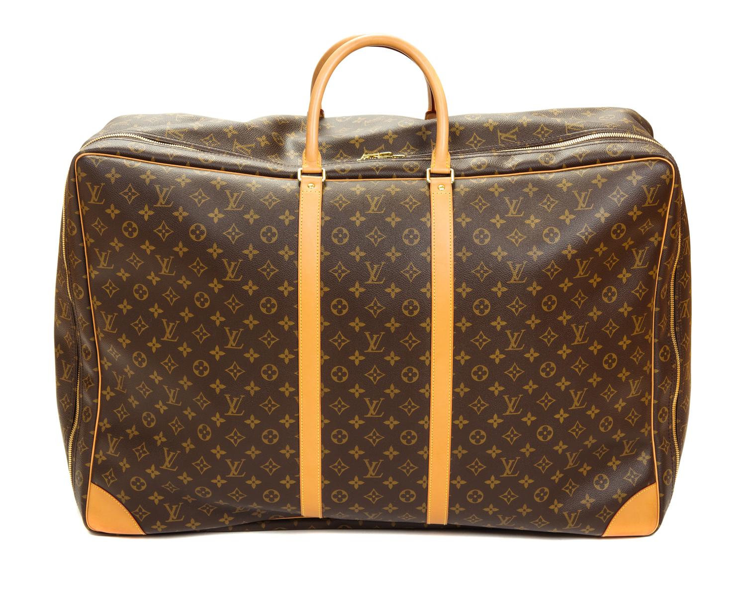 A Louis Vuitton Monogram Canvas Sirius Soft Sided Suitcase, 19"H x 27.5"W x 8.25"D; Handle drop: 4.5".