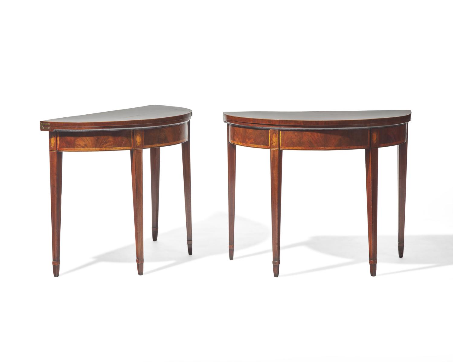 A fine pair of George III inlaid mahogany demilune card tables, circa 1790