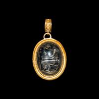 An Etruscan Revival Gold and Rock Crystal Pendant