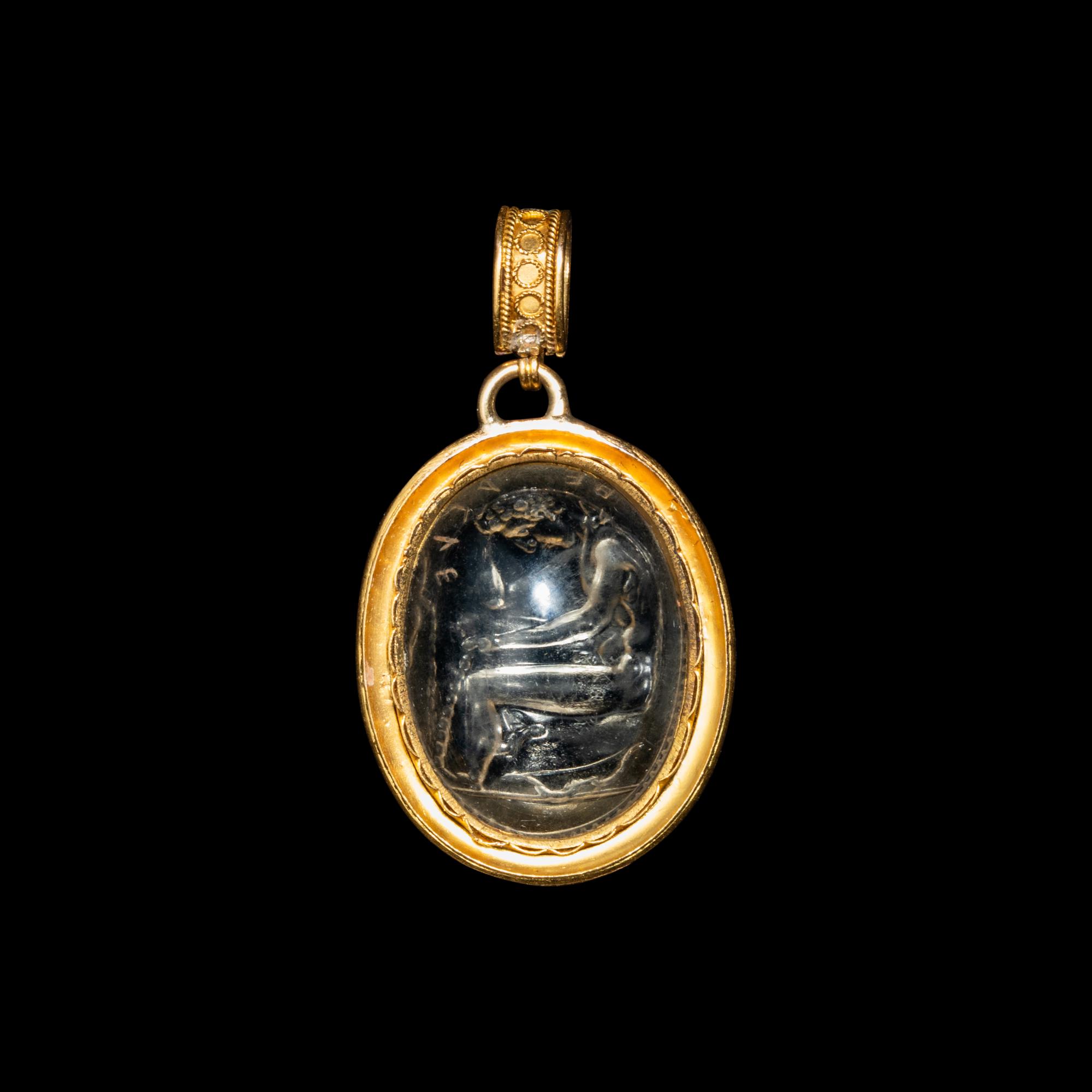 An Etruscan Revival Gold and Rock Crystal Pendant