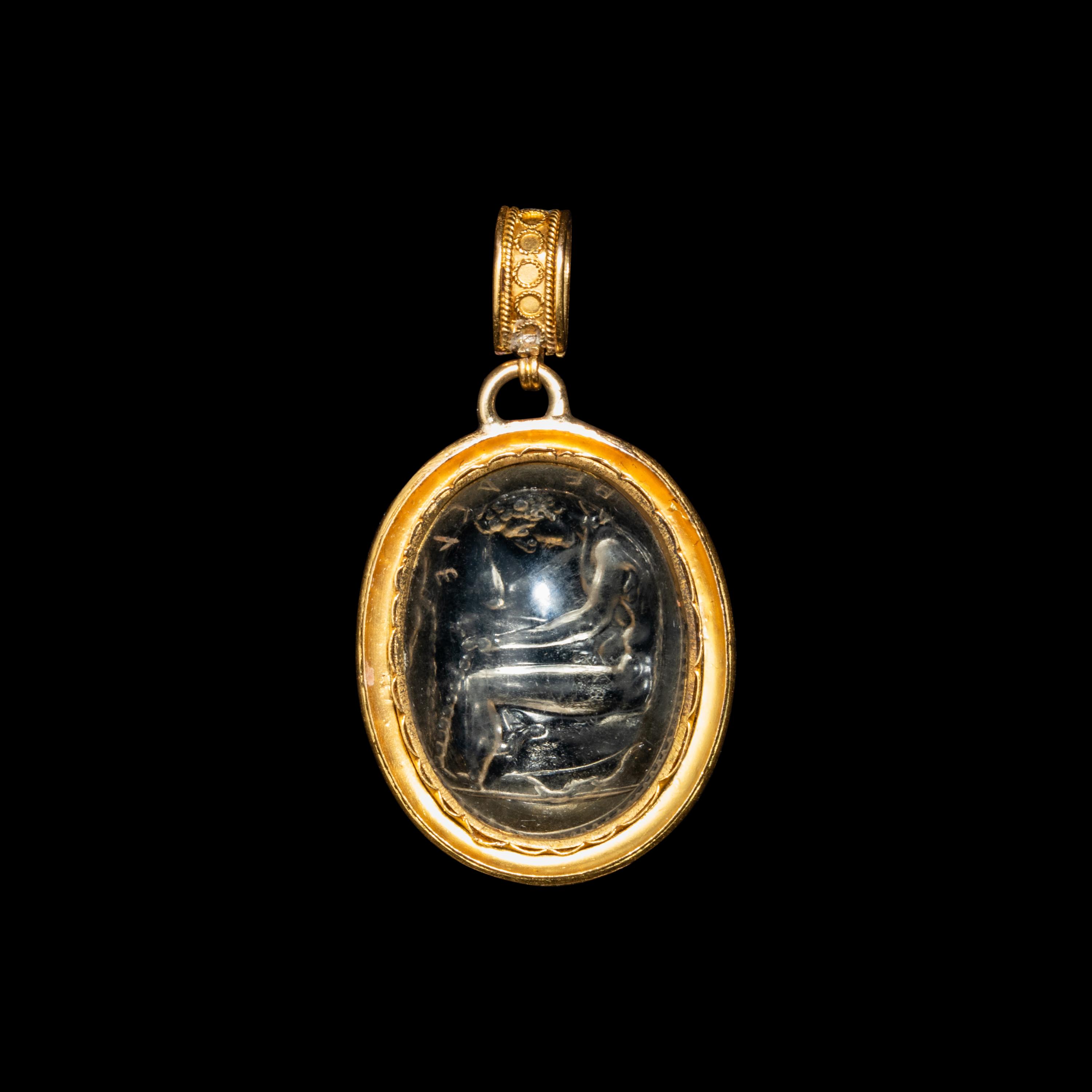 An Etruscan Revival Gold and Rock Crystal Pendant