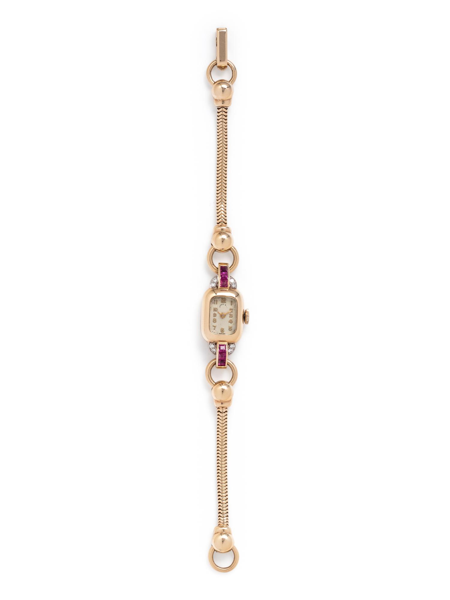 CRESARROW, SHREVE & CO., 14K YELLOW GOLD, SYNTHETIC RUBY AND DIAMOND WRISTWATCH
