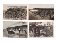 [RAILROADS]. A group of 71 RPPCs and photographs of trains, incl. train wrecks.