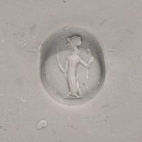 A Neoclassical Glass Intaglio with the Goddess Venus and a Carnelian Ring Stone