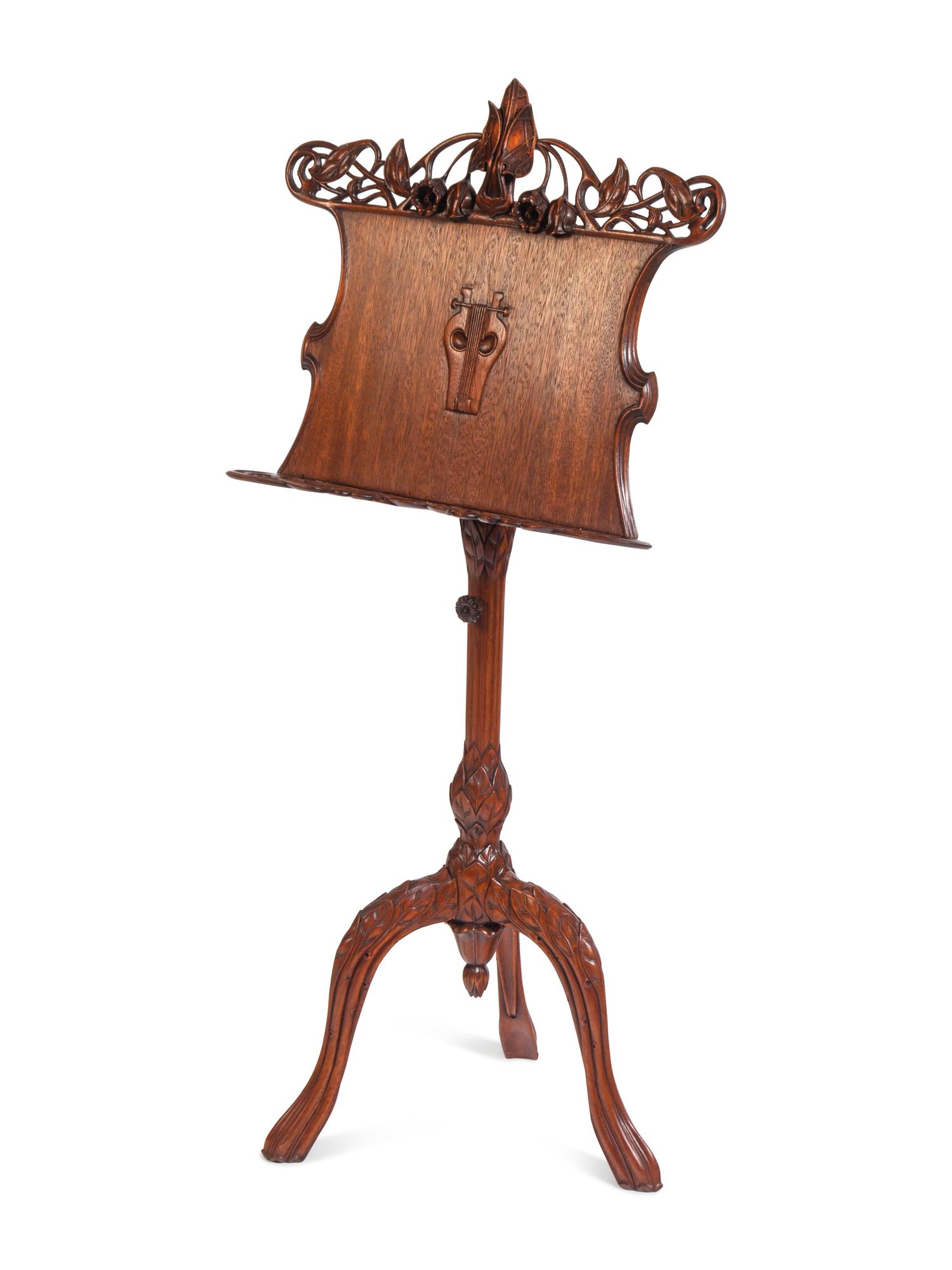 An Art Nouveau Style Carved Walnut Music Stand