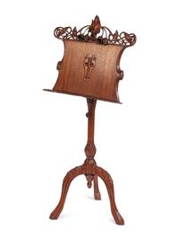 An Art Nouveau Style Carved Walnut Music Stand