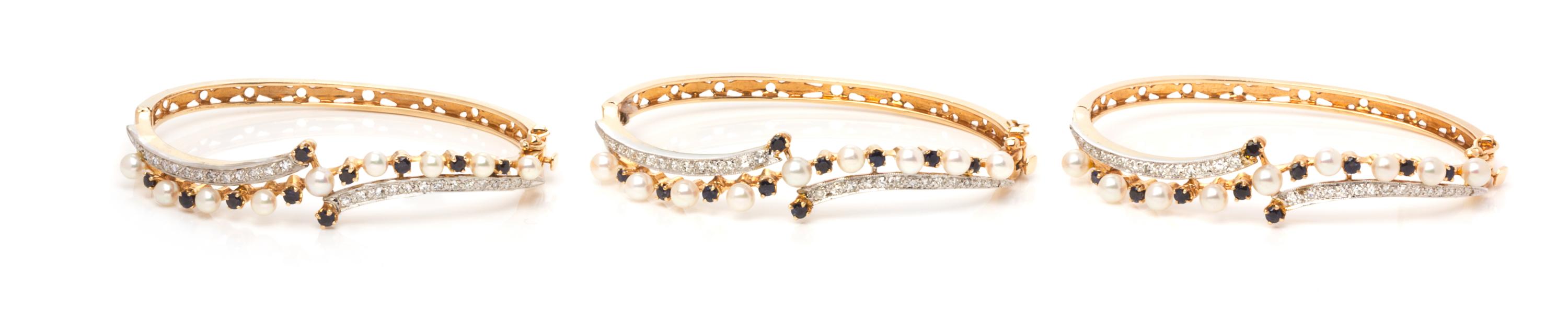 A Collection of Yellow Gold, Cultured Pearl, Diamond and Sapphire Bangles, 30.90 dwts.