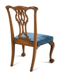 A Set of Ten George III Style Carved Mahogany Dining Chairs