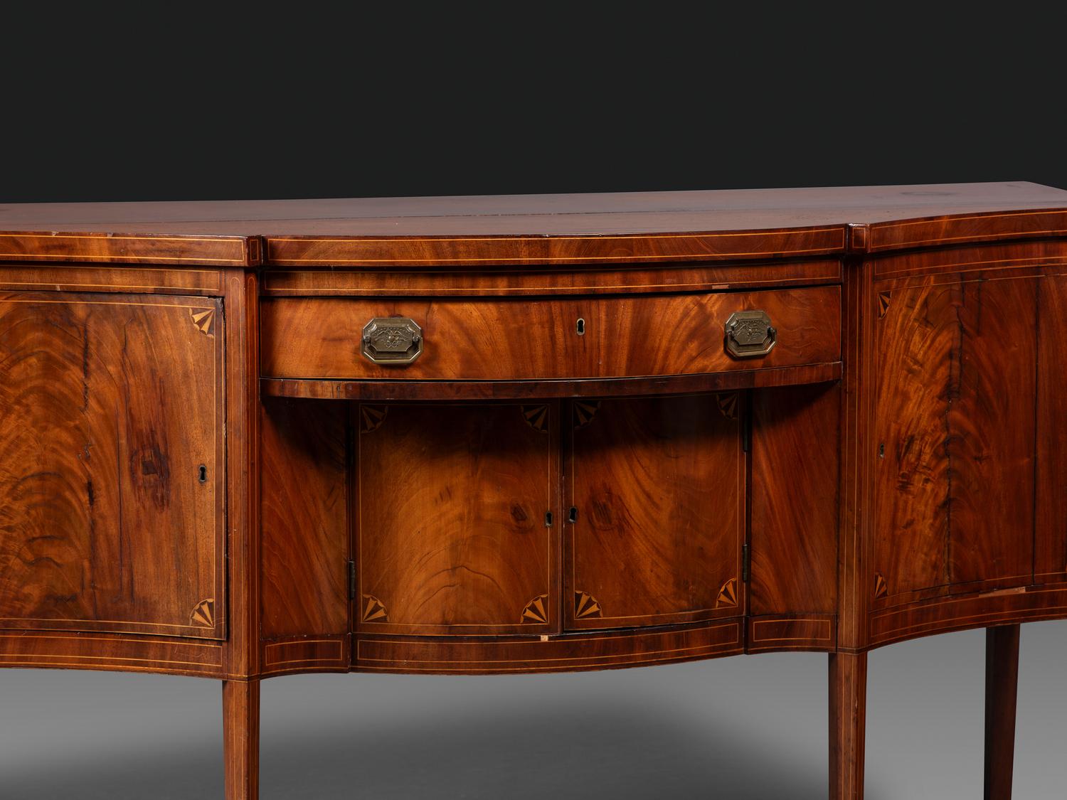 A Federal Fan-Inlaid and Figured Mahogany Serpentine Sideboard