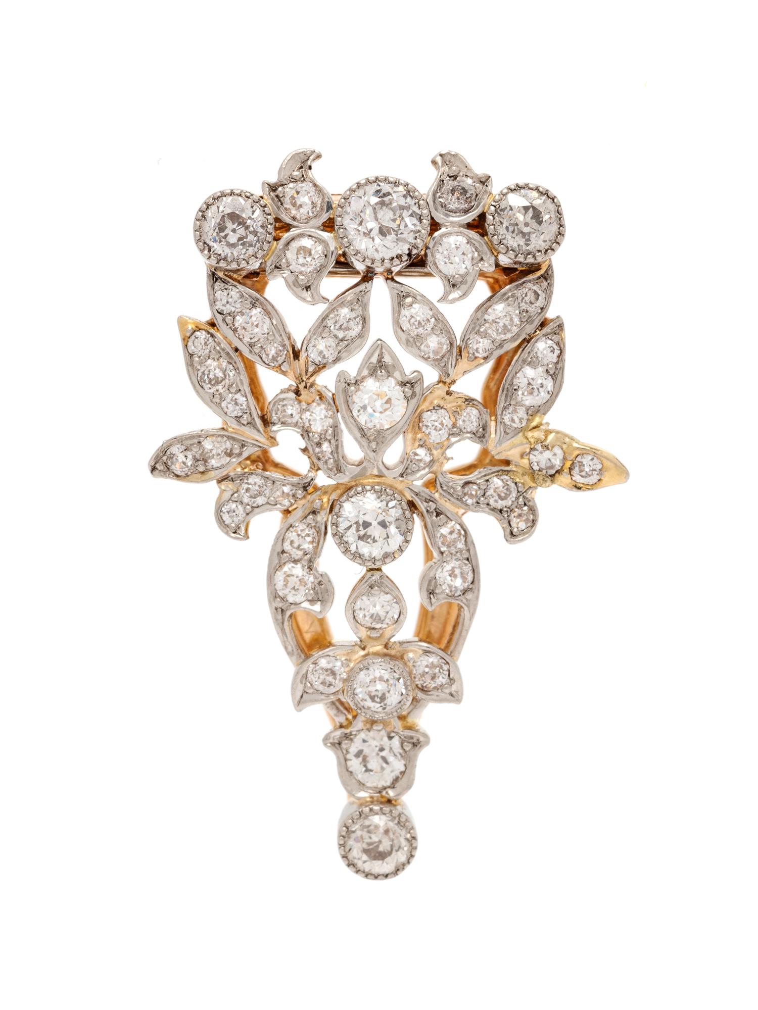 A Platinum Topped Yellow Gold and Diamond Clip Brooch,