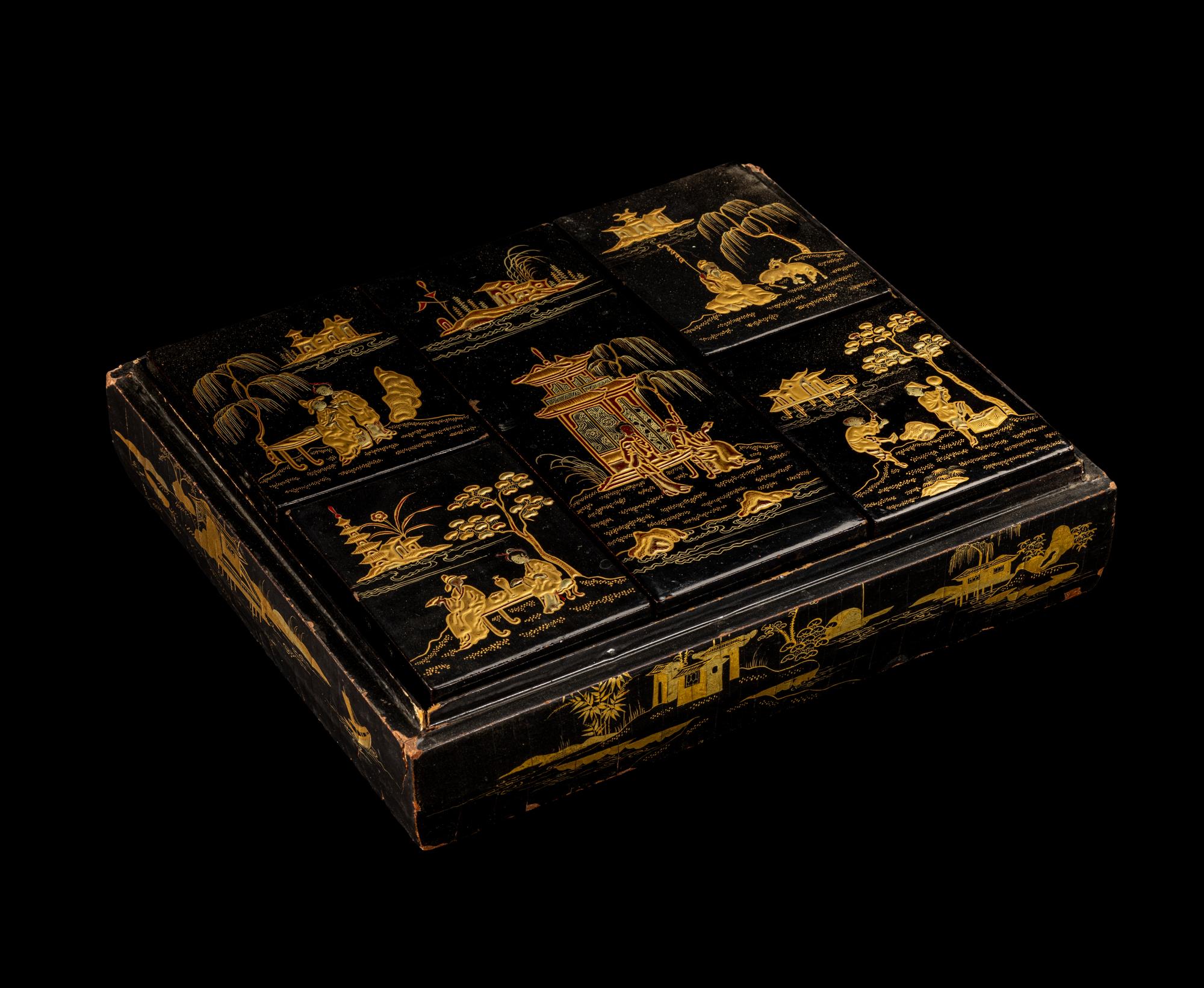 A Chinese Export Gilt and Red Highlighted Black Lacquered Box and Cover