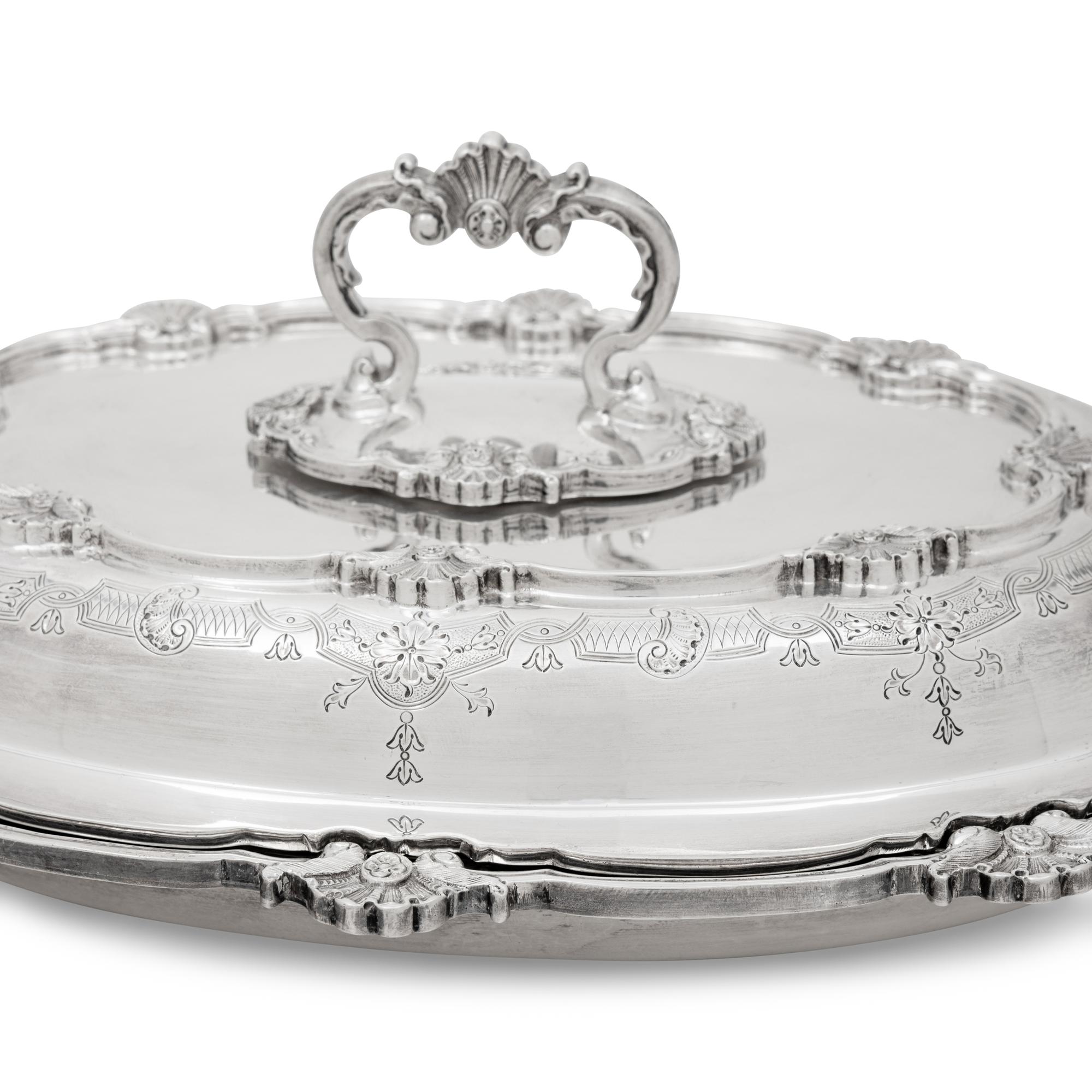 A Pair of English Silver Covered Vegetable Dishes