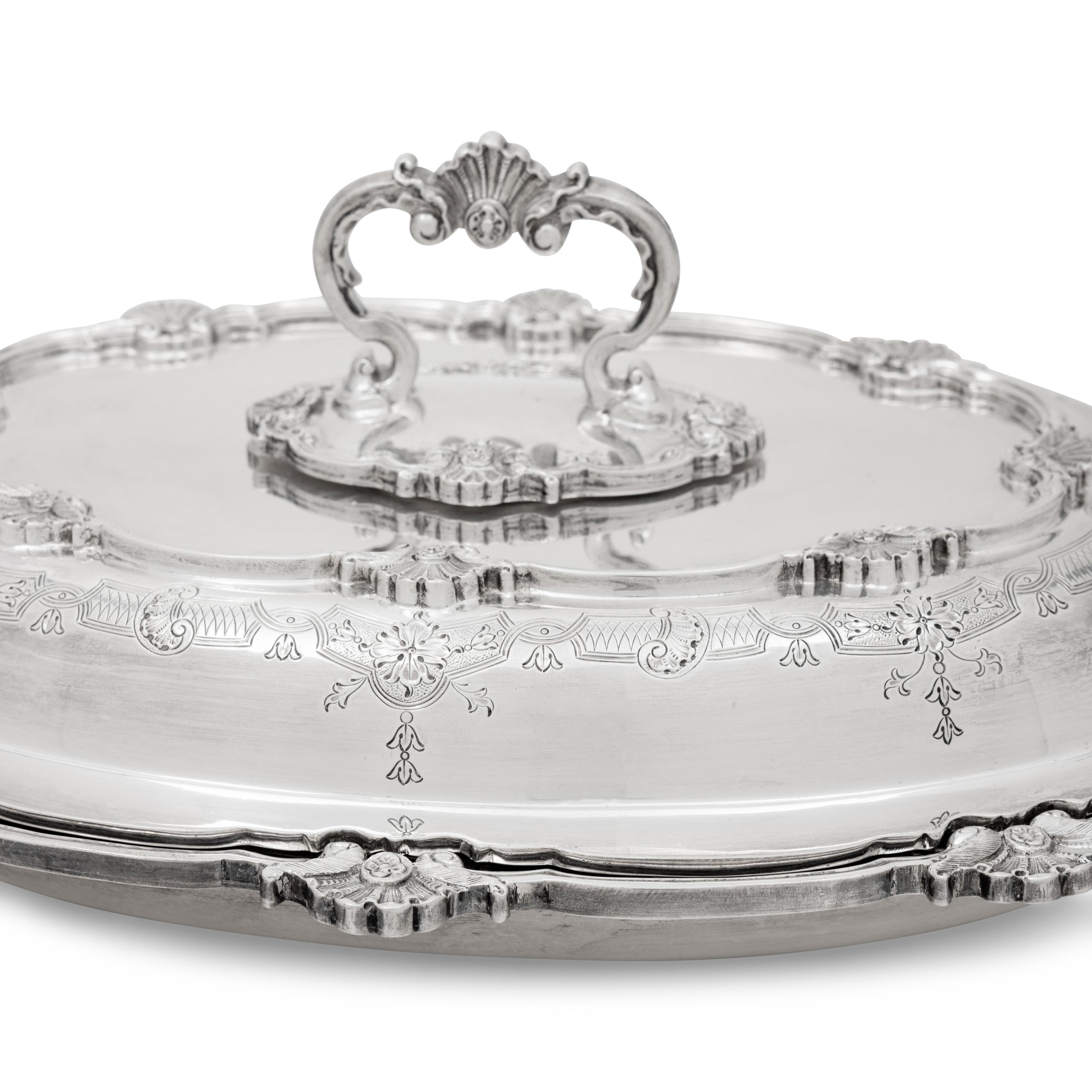 A Pair of English Silver Covered Vegetable Dishes