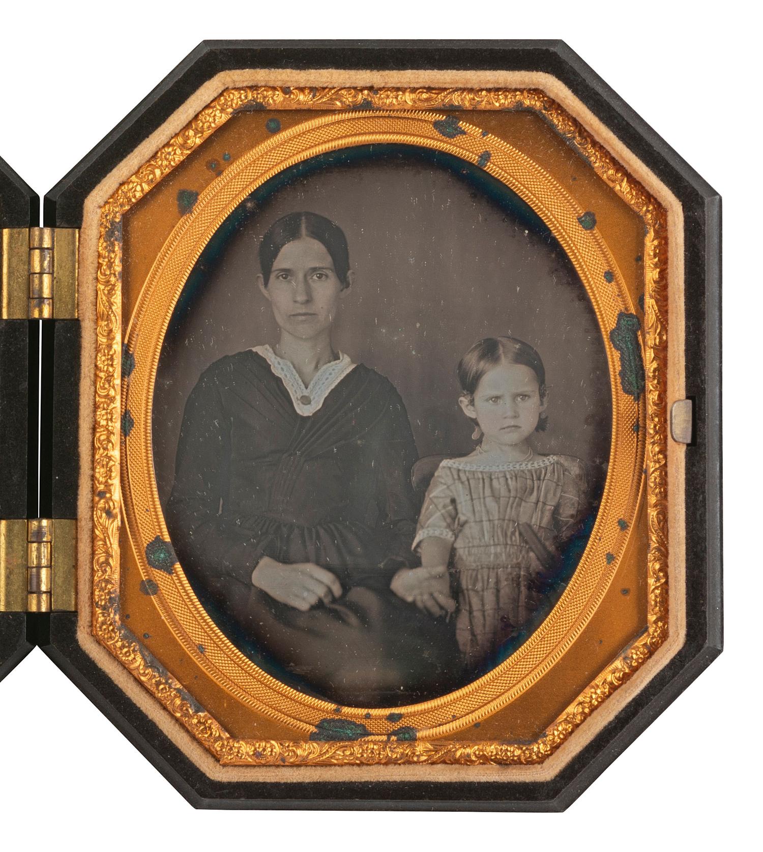 [EARLY PHOTOGRAPHY]. A pair of sixth plate daguerreotypes of mothers with their children.