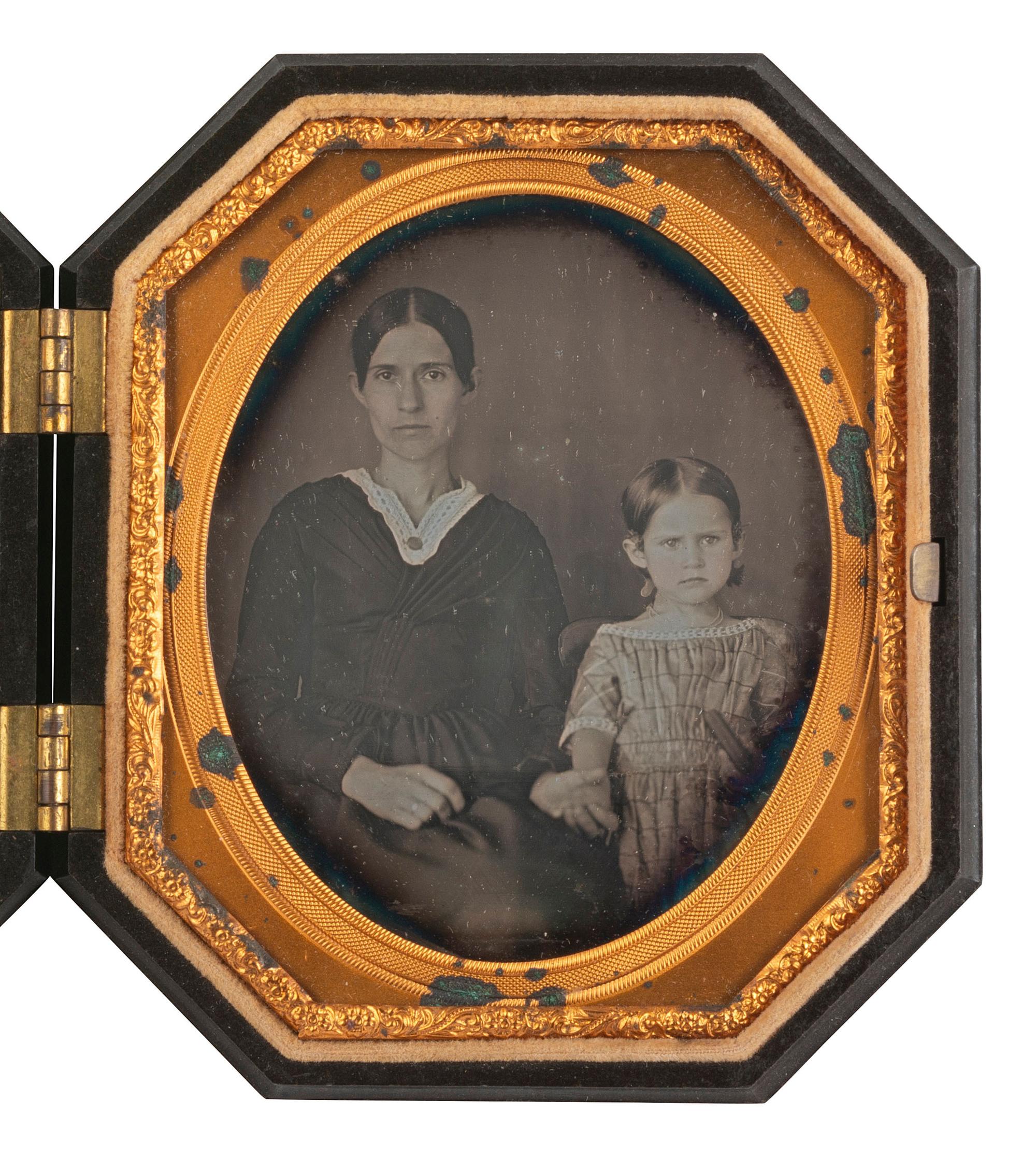 [EARLY PHOTOGRAPHY]. A pair of sixth plate daguerreotypes of mothers with their children.