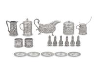 An Assembled Group of Sterling Silver Floral Repousse Tablewares, Tiffany & Co., New York, NY, Dates Ranging 1853 to Late 19th Century