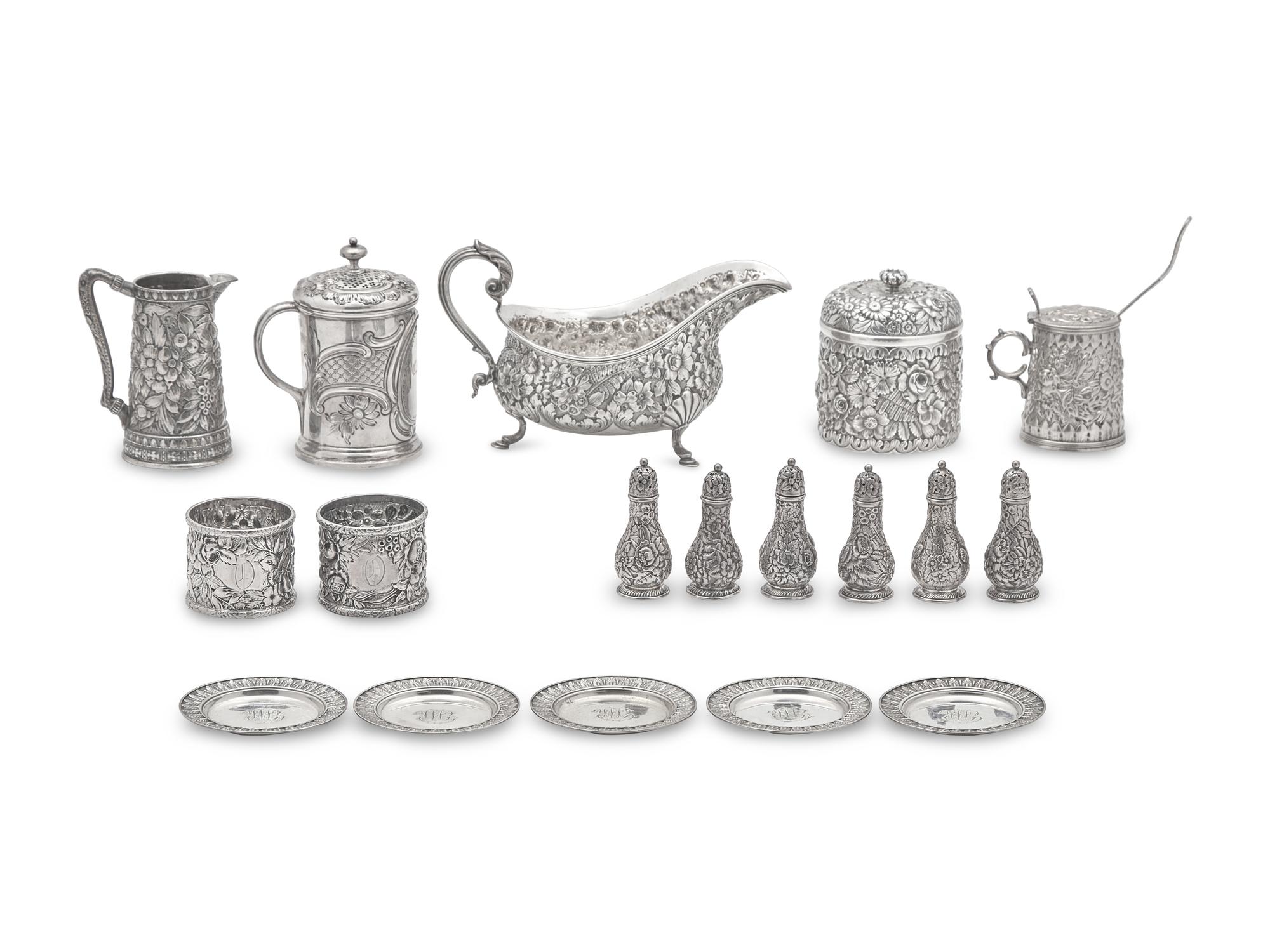 An Assembled Group of Sterling Silver Floral Repousse Tablewares, Tiffany & Co., New York, NY, Dates Ranging 1853 to Late 19th Century