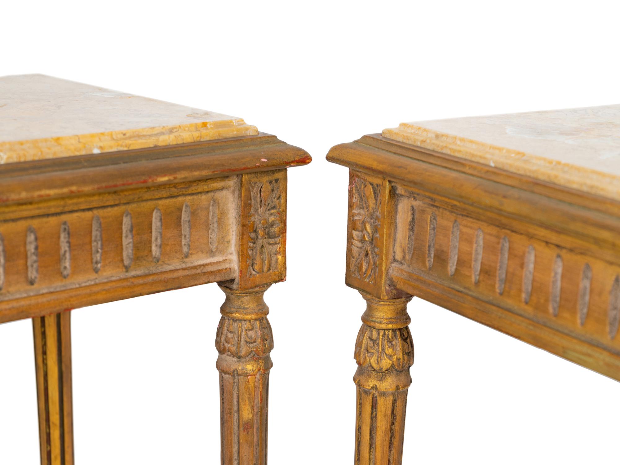 A Pair of Louis XVI Style Painted and Parcel Gilt Console Tables — EARLY 20TH CENTURY