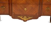 A French Gilt Metal Mounted Mahogany and Kingwood Marquetry Marble-Top Commode