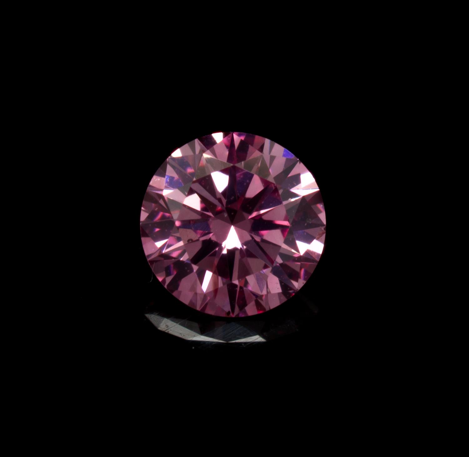 A 0.21 Carat Round Brilliant Cut Fancy Intense Purplish Pink Diamond,