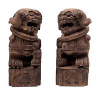A Pair of Carved Wood Buddhistic Lions