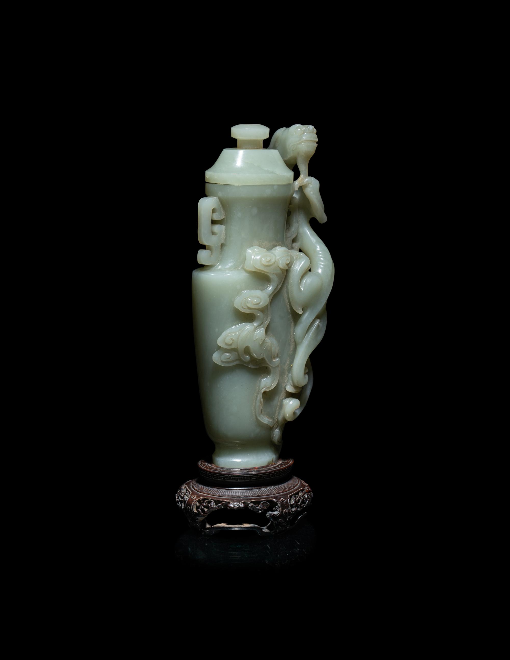 A Finely Carved Chinese Celadon Jade 'Chilong' Covered Vase