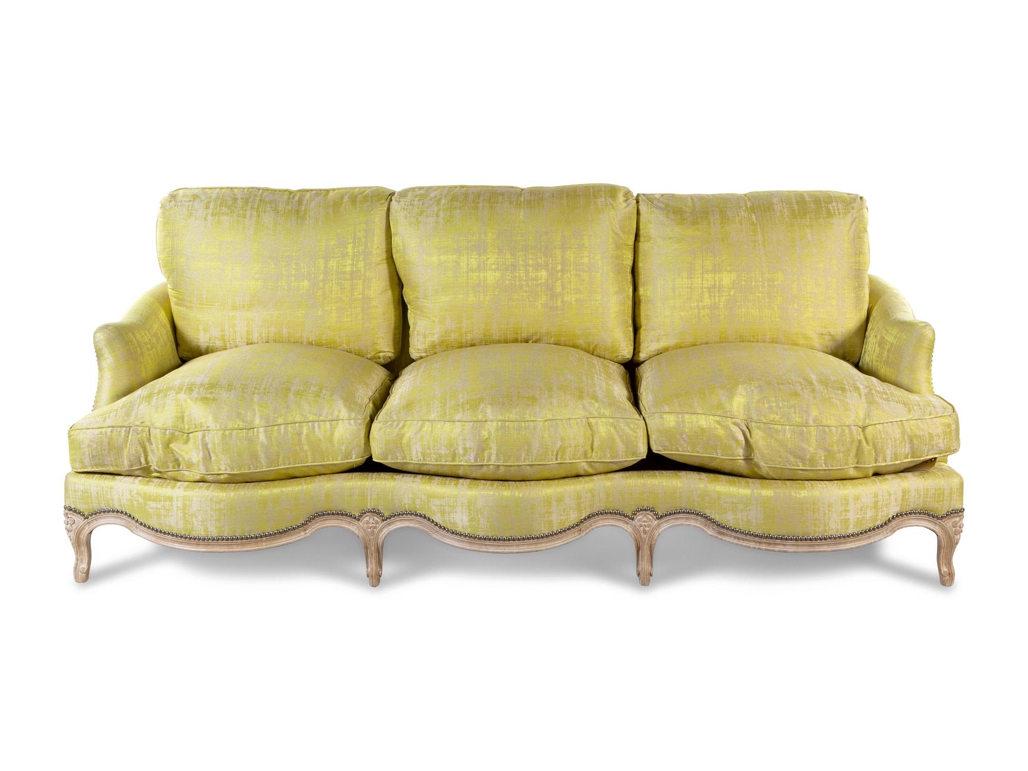A Louis XV Style Cerused Silk Upholstered Sofa
