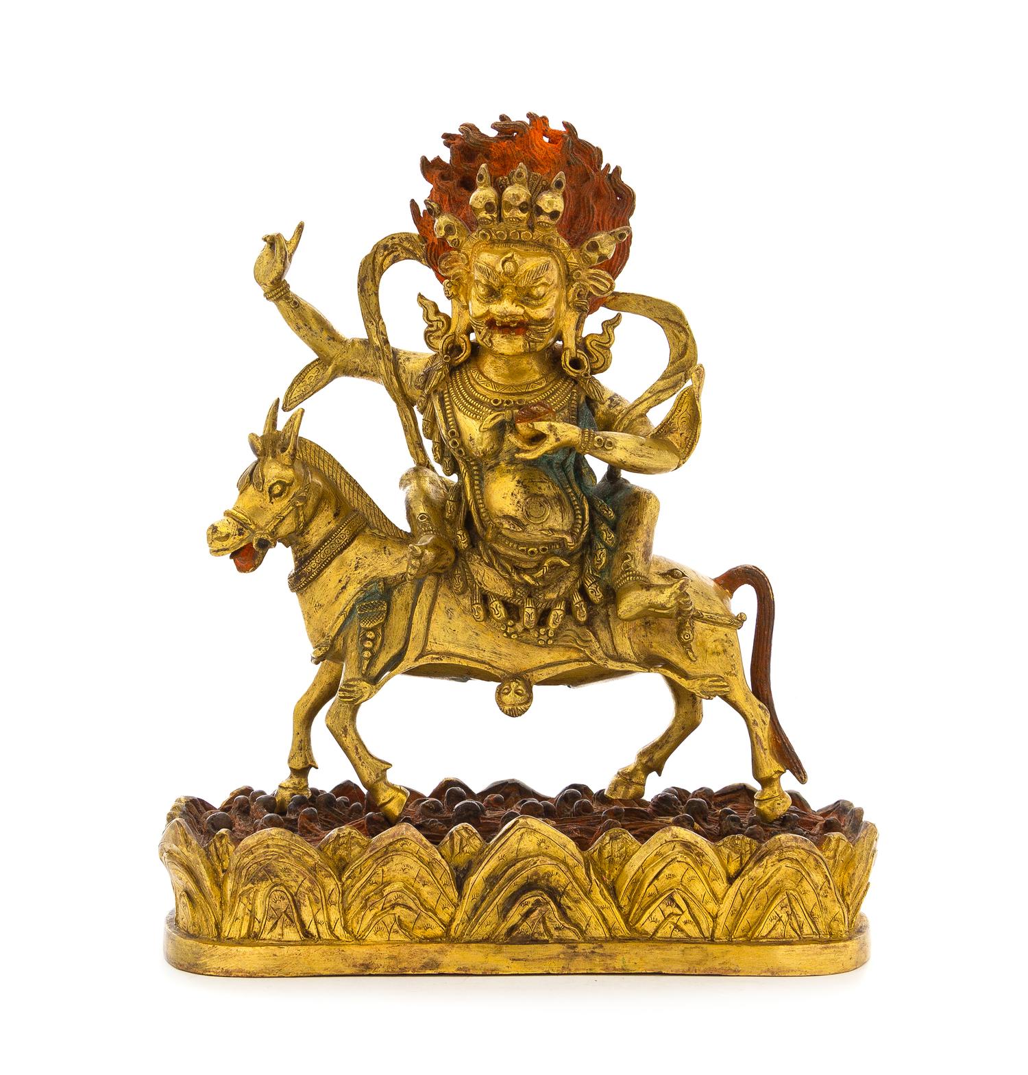 A Sino-Tibetan Gilt Bronze Figure of Magzor Gyalmo Total height 11 1/4 inches. — 18TH/19TH CENTURY