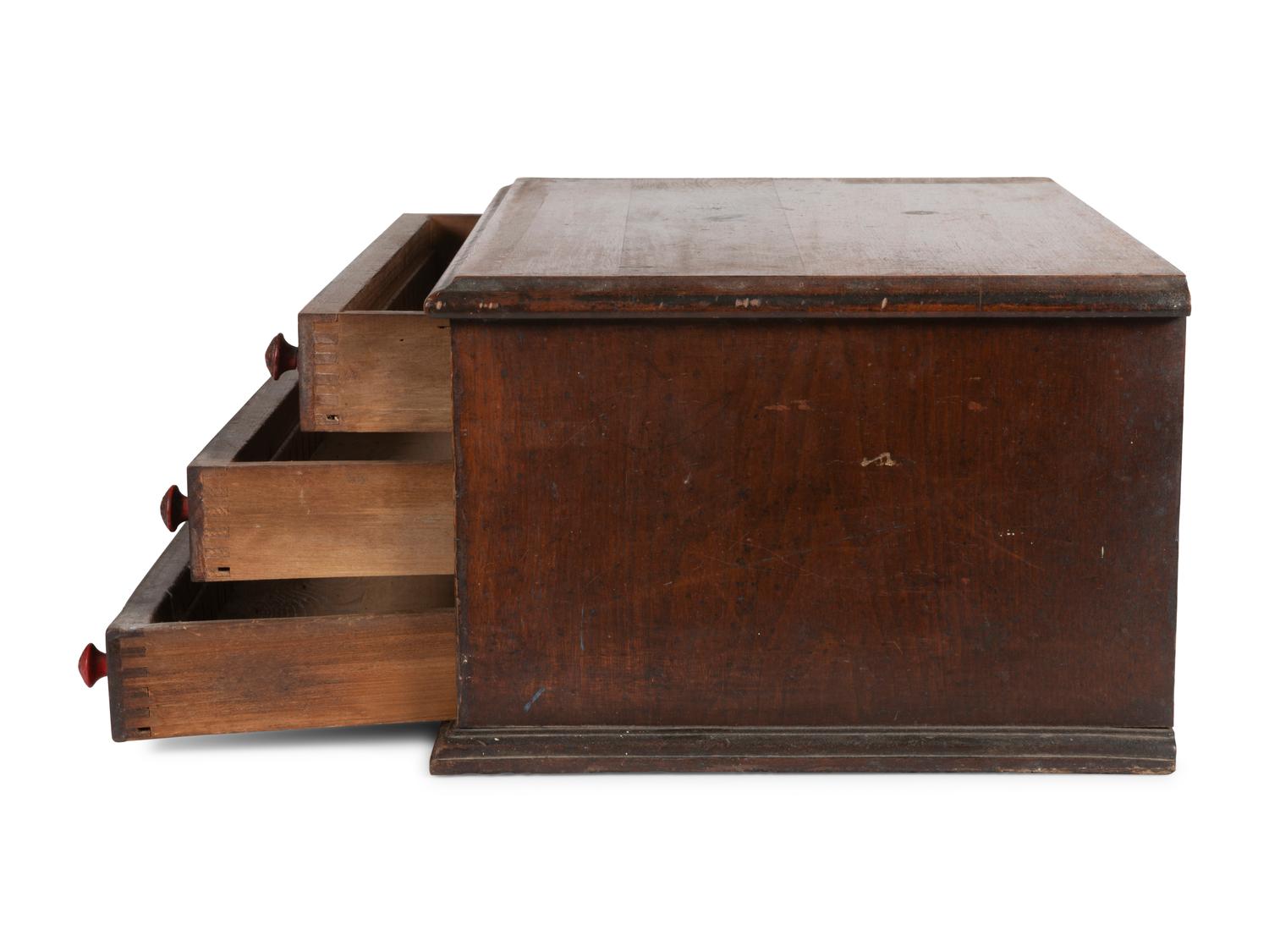 A Thomas Russell Painted Wood Spool Cabinet