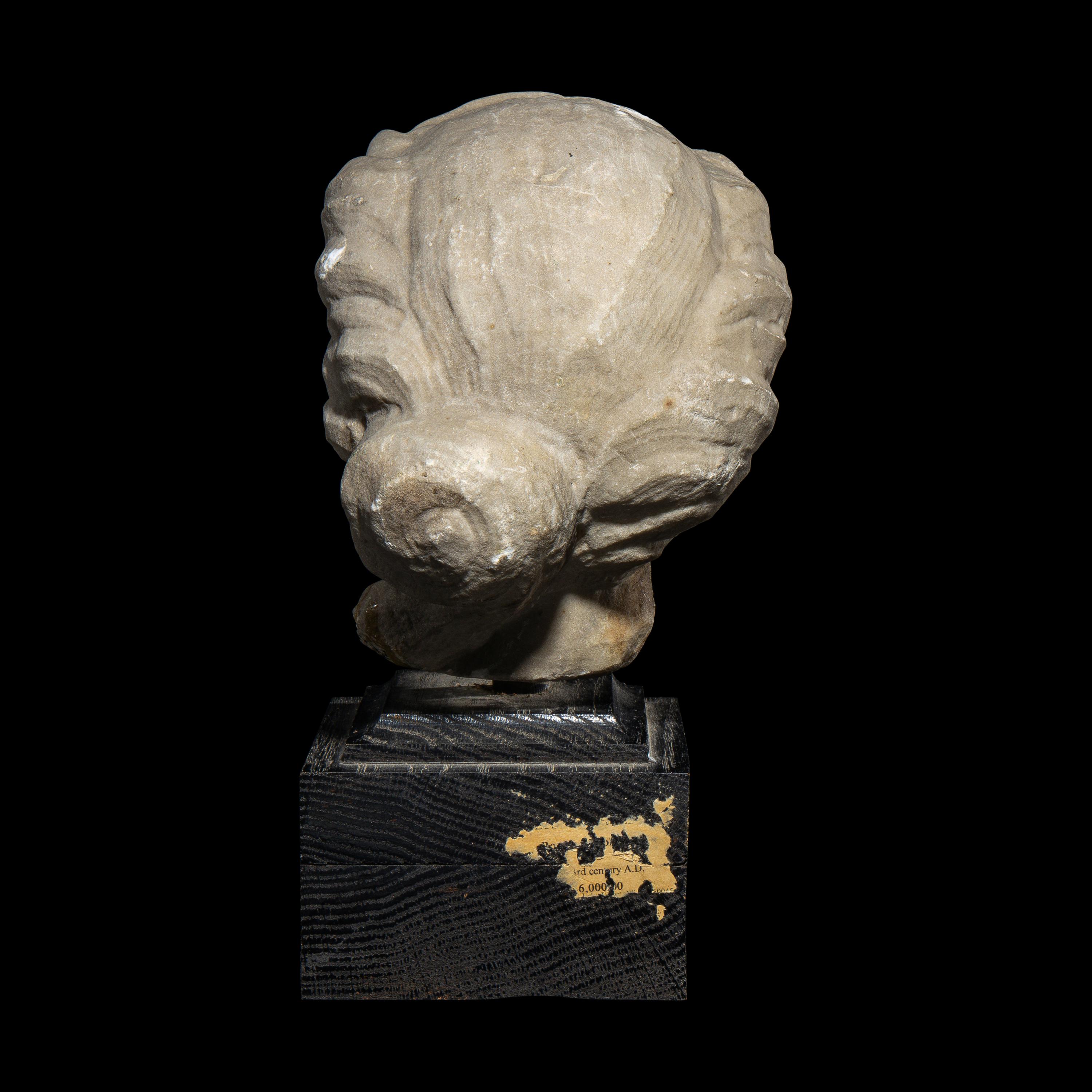 A Roman Marble Head of a Goddess