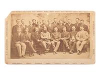 [TRAVELS & EXPLORATION] -- [GREELY, Adolphus (1844-1935)]. Group portrait of Greely with members of the Lady Franklin Bay Expedition. Newburyport, MA: H.P. Macintosh, [1881].