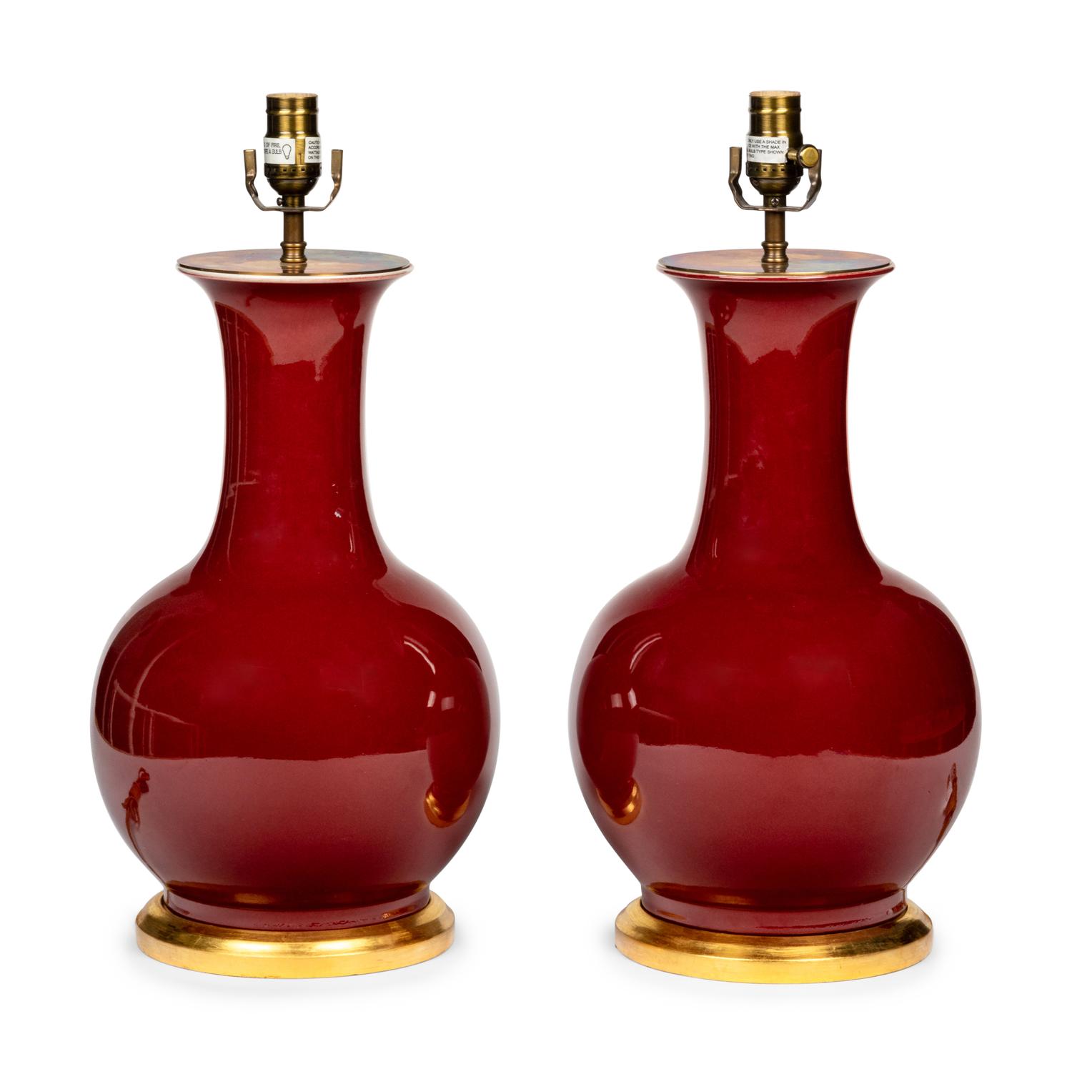 A Pair of Iron Red Glazed Porcelain Lamps
