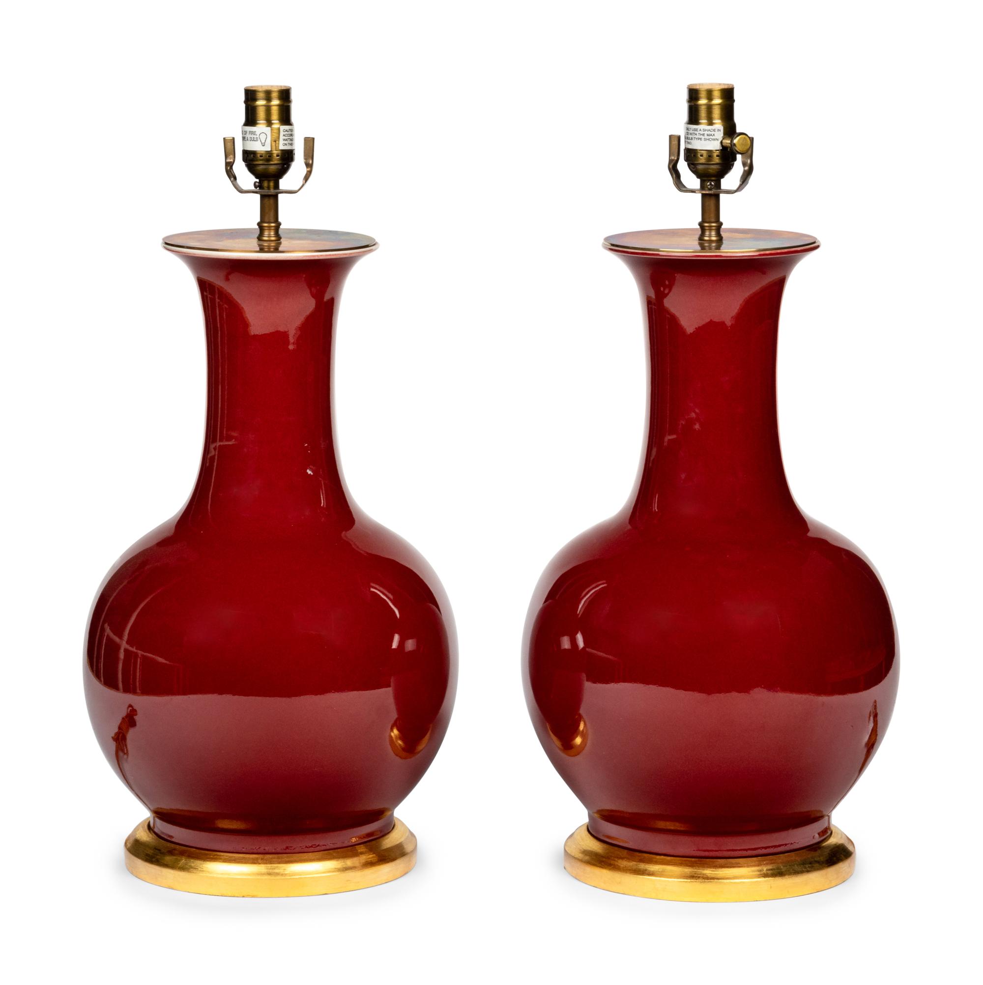 A Pair of Iron Red Glazed Porcelain Lamps