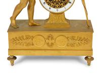 An Empire Gilt Bronze Figural Mantel Clock