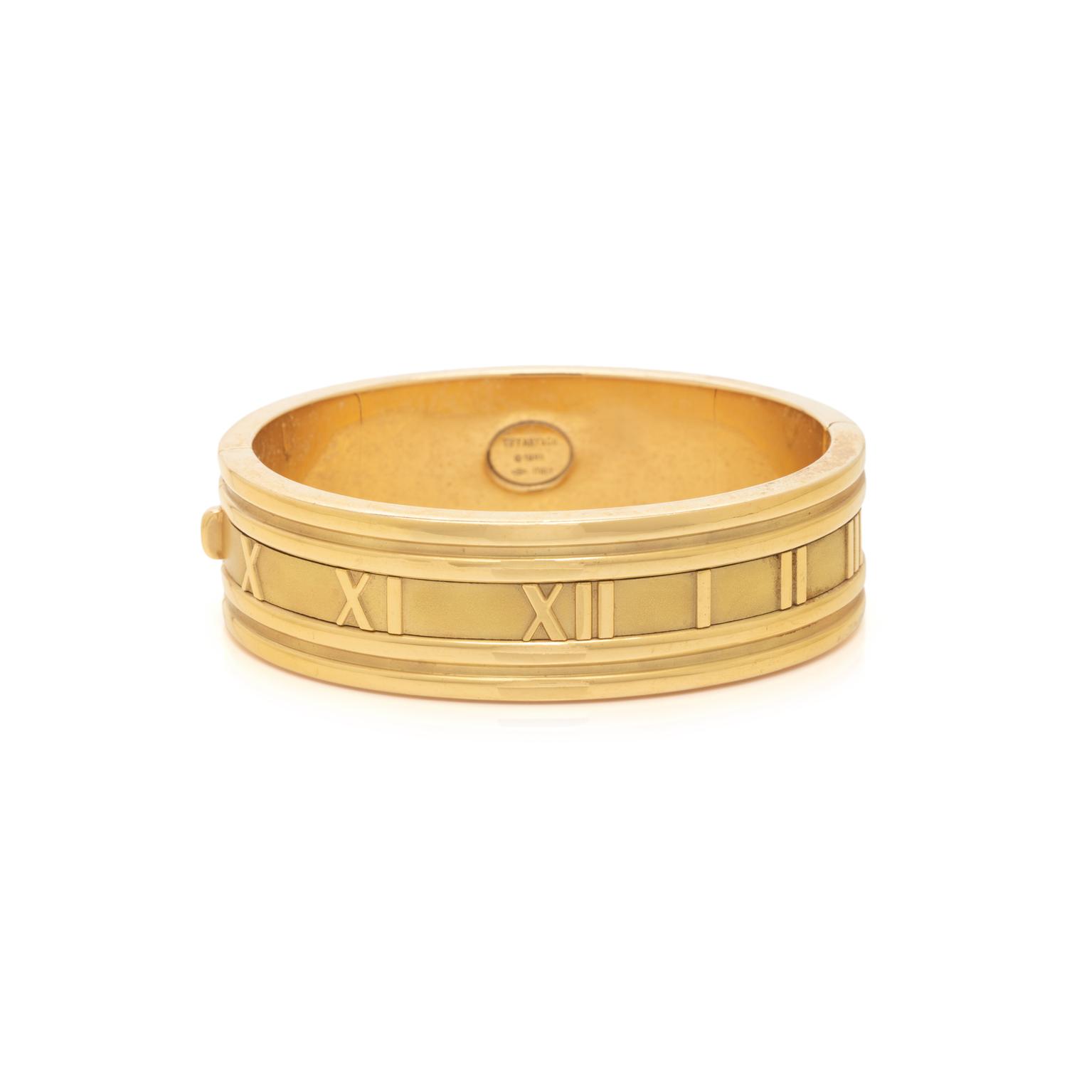 TIFFANY & CO., YELLOW GOLD 'ATLAS' BANGLE BRACELET