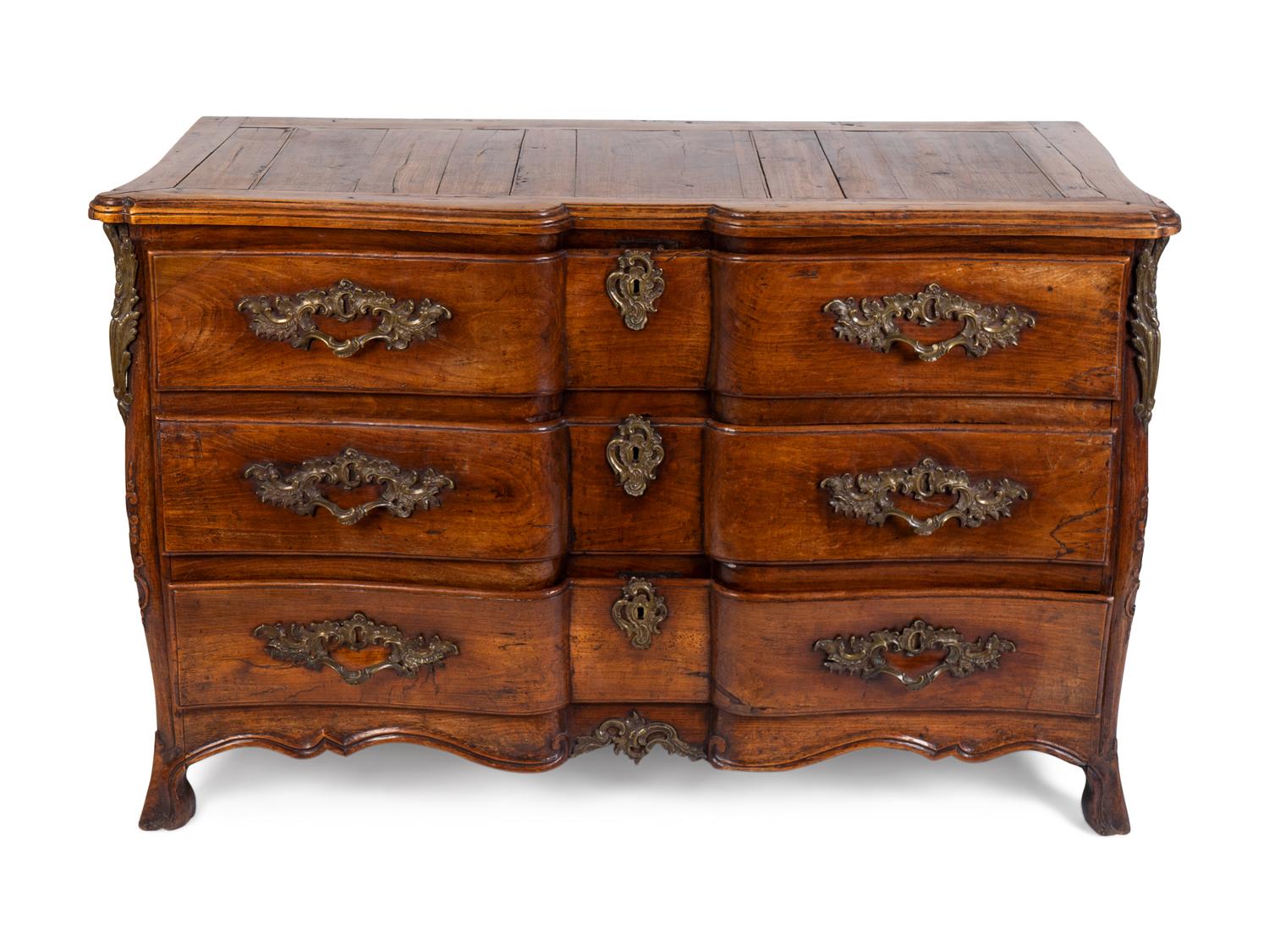 A Louis XV Provincial Walnut Commode — THIRD QUARTER 18TH CENTURY