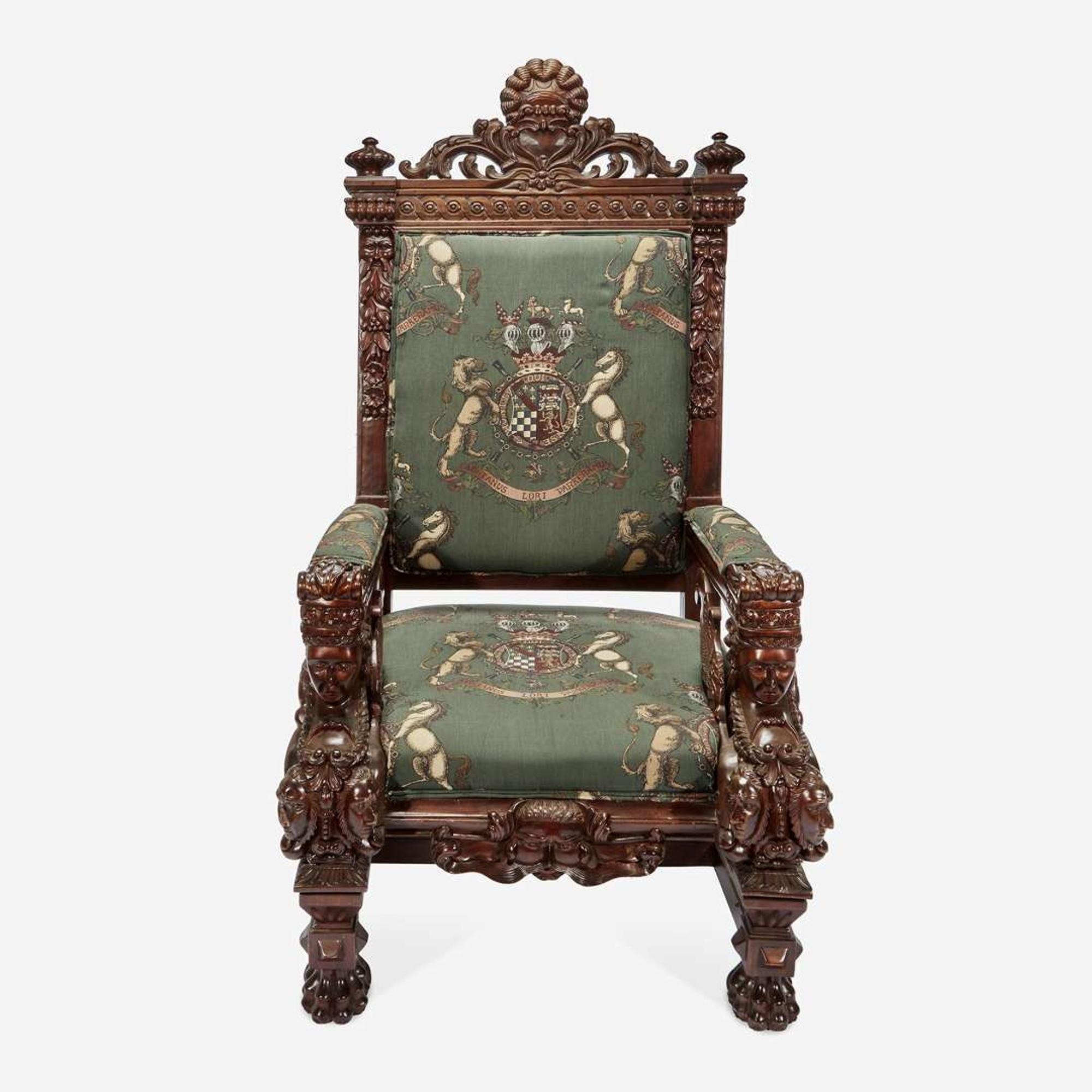 A Large Carved Renaissance Revival Throne Chair Upholstered in Armorial Fabric