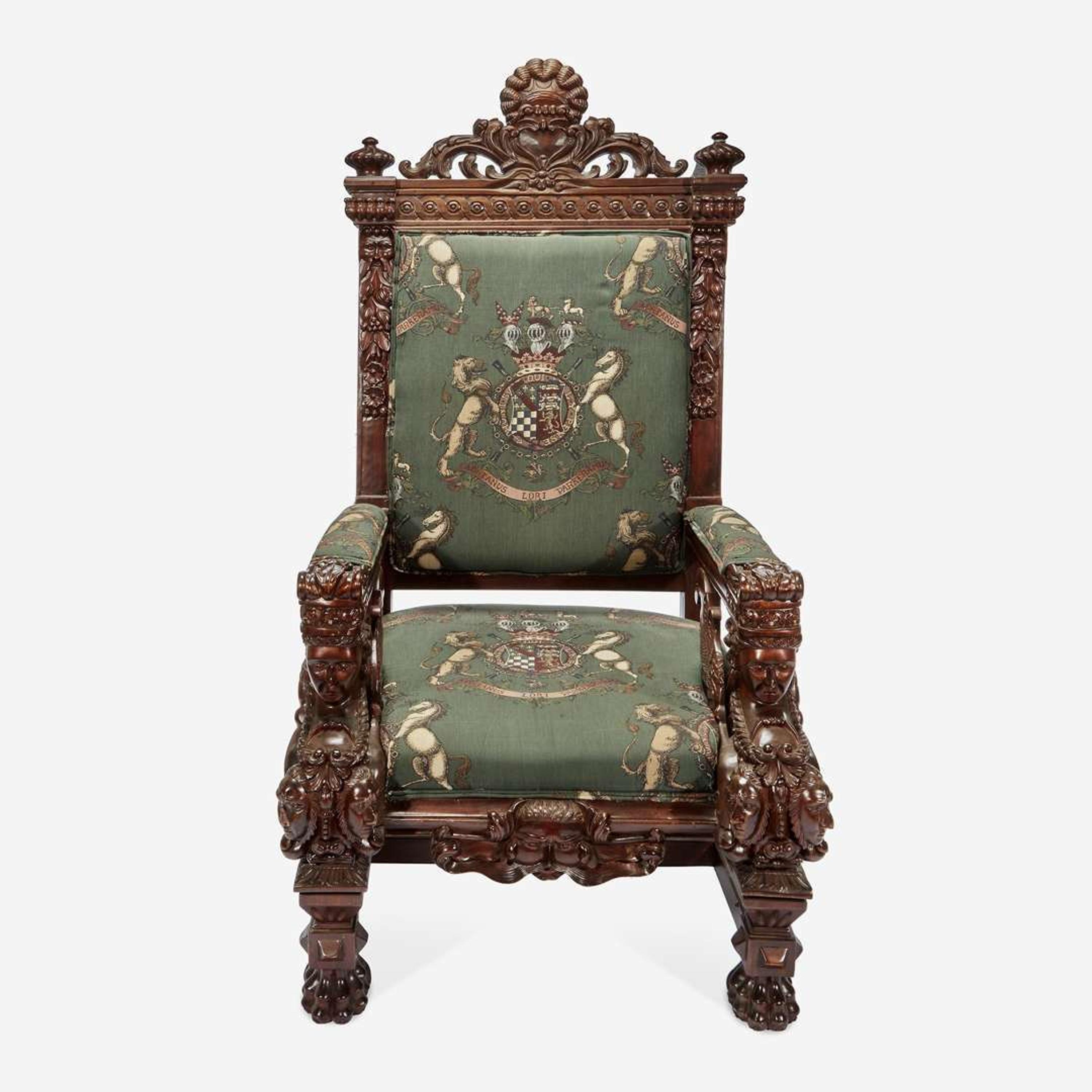 A Large Carved Renaissance Revival Throne Chair Upholstered in Armorial Fabric